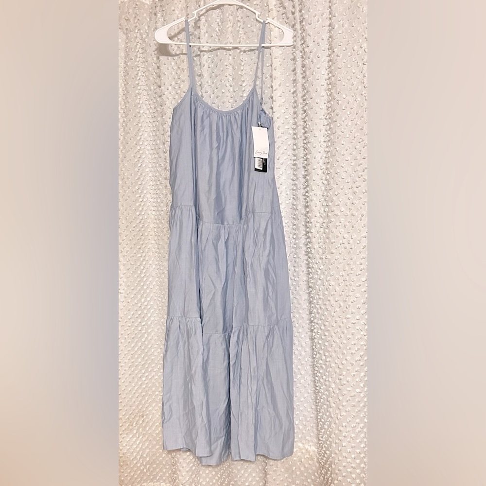 Summer dress. Hits mid-calf. Airy and soft. Adjustable straps